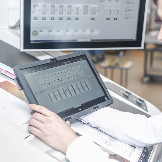 man looking at computer analysis